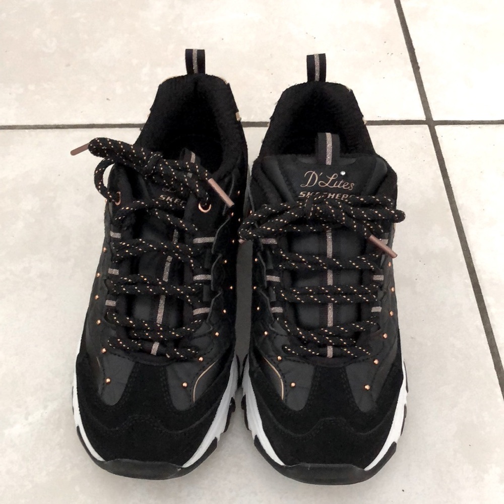 Skechers Black and Gold Sneakers for Modern Style